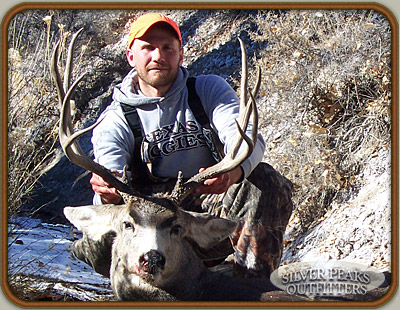 Matt with his wall-hanger trophy Colorado Mule Deer Buck